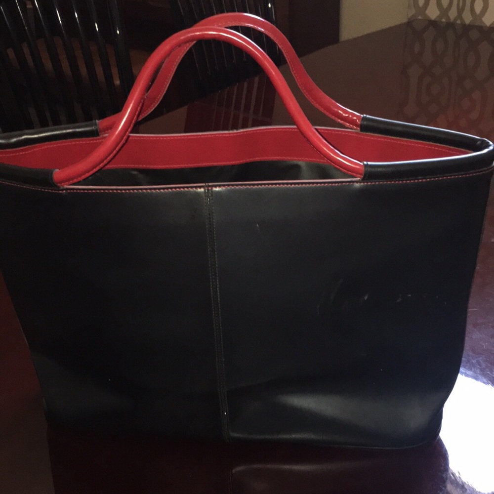 Leather black tote bag with red handle